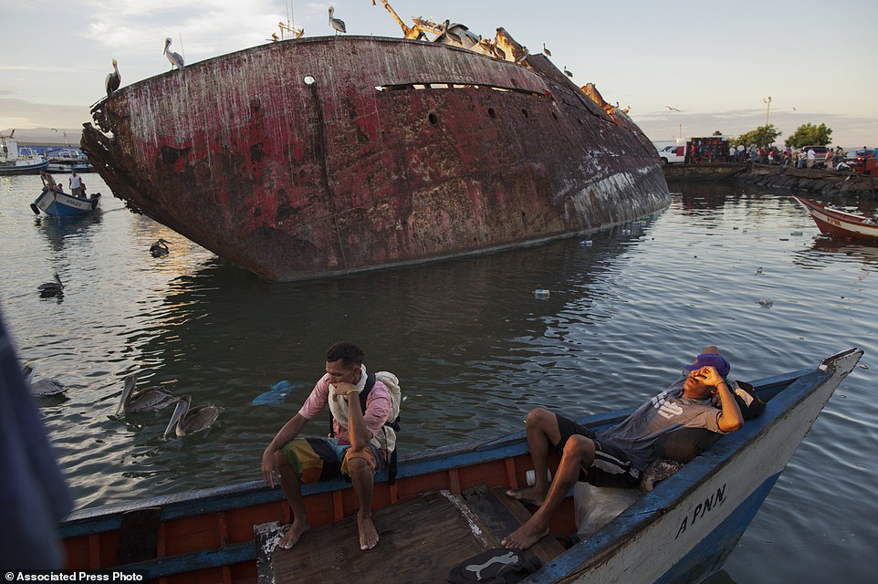 4mvLtwqWjede6b84ce3182856961-4012206-In_this_Nov_30_2016_photo_fishermen_rest_after_selling_their_cat-a-27_1481213410029.jpg